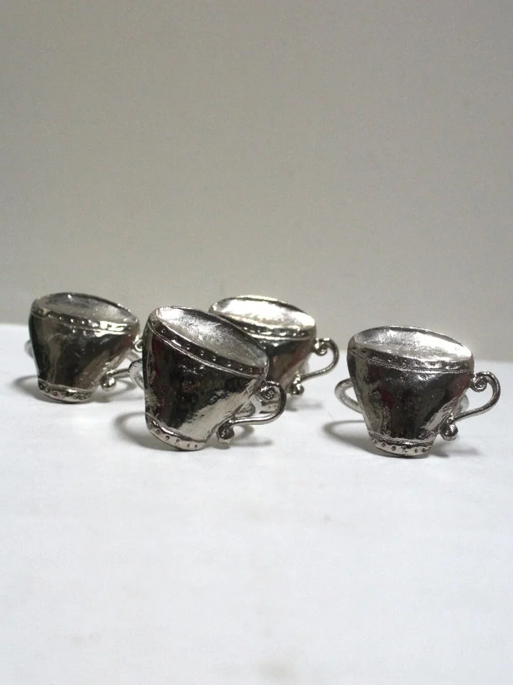 Set of 4 Emenee Silver Tone Coffee or Tea Cup Shaped Napkin Rings